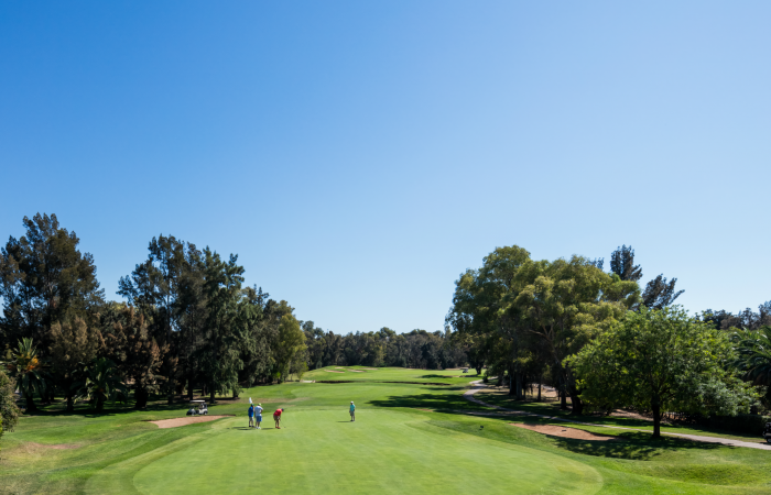People playing golf in the Penina Course